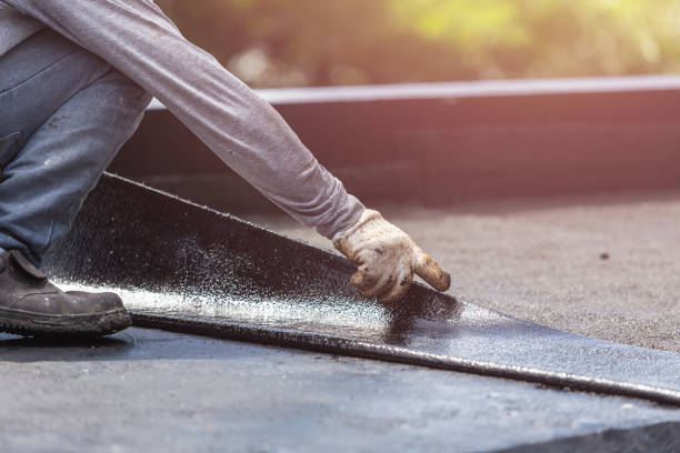 Professional Waterproofing technician working in Leopolis, WI